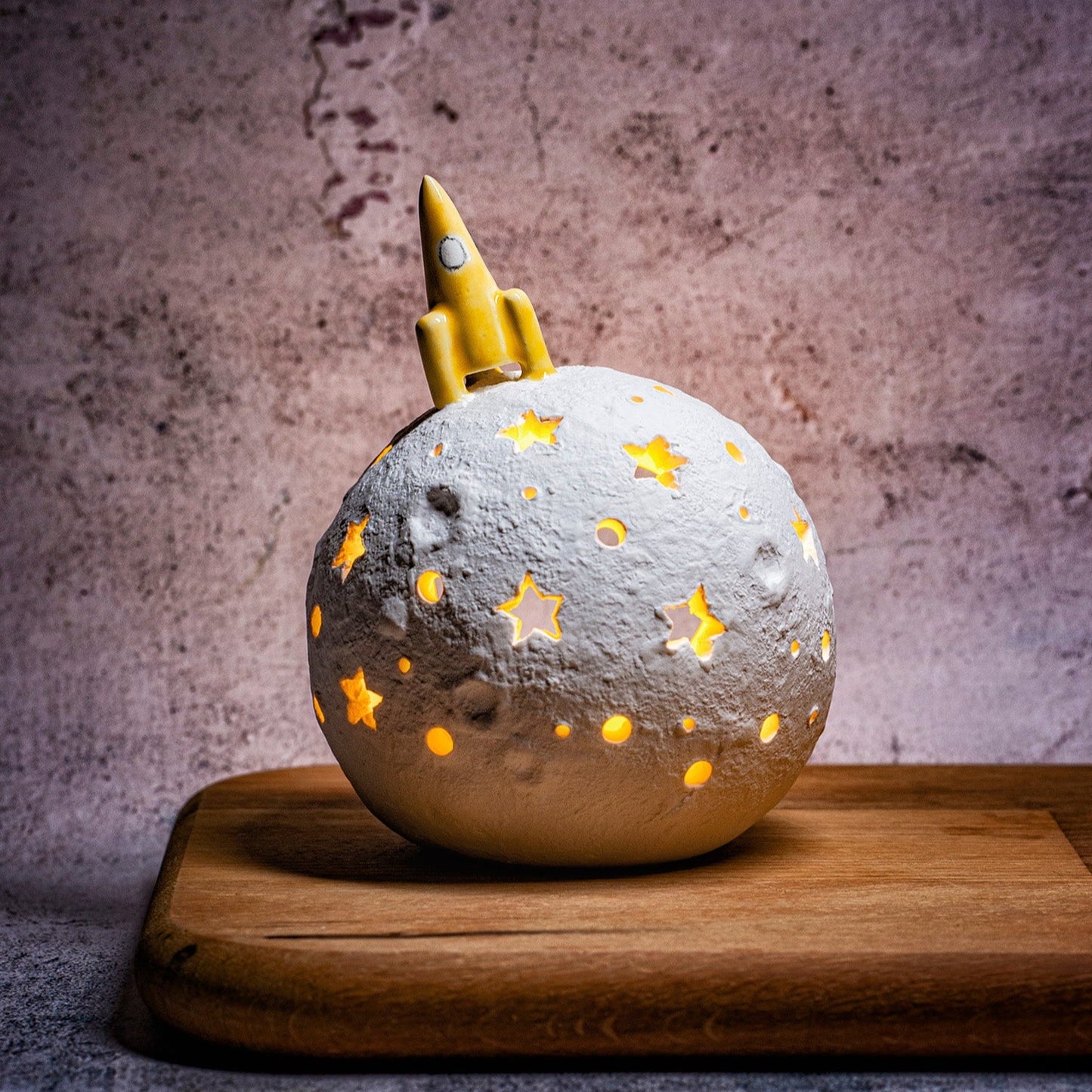 Luna Estrellada con cohete