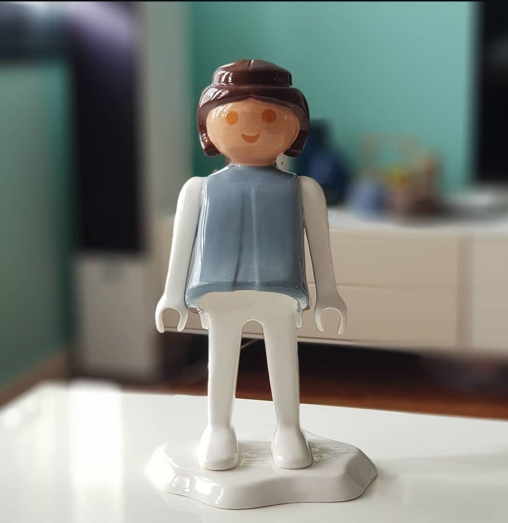 Muñeca de la sonrisa eterna